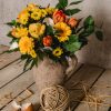 Blumen gel und orange mit Kücken