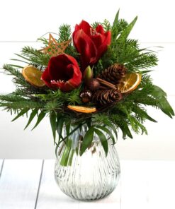 weihnachtlicher Strauß Amaryllis mit Rost Stern