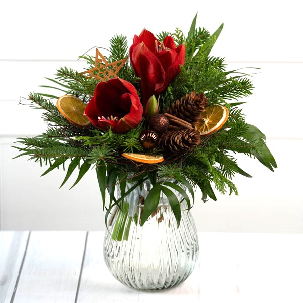 weihnachtlicher Strauß Amaryllis mit Rost Stern